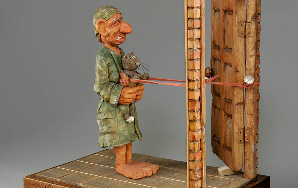 Puttin' Out The Cat Carving